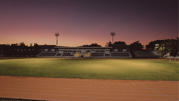 Empty sports field highlighting referee shortage